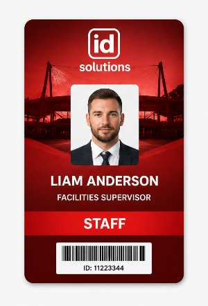 Red large format staff ID card with photo, barcode and stadium background